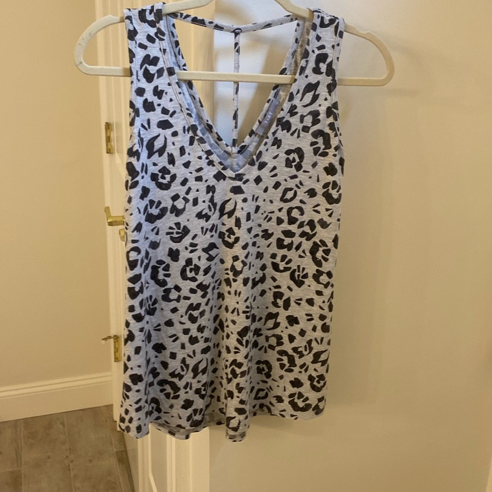 Strappy tank w/the softest fabric.Tart brand bought @ boutique XS fits like a S